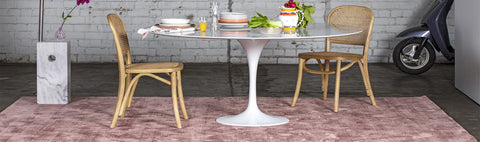 Choosing a dining room rug size